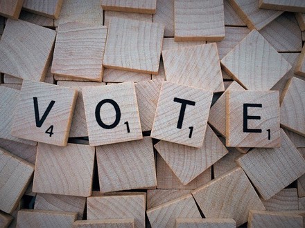'VOTE' spelt out in Scrabble letters