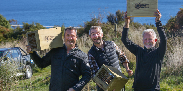 Volunteers with pest traps