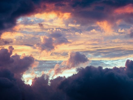 Sun shines through clouds