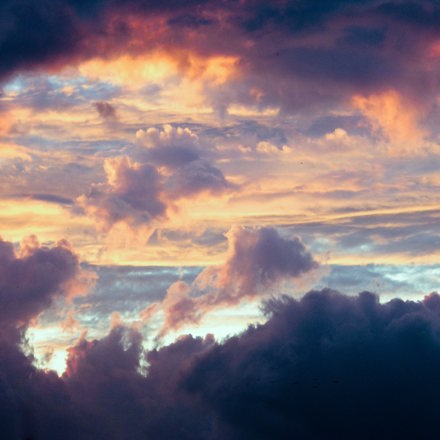 Sun shines through clouds