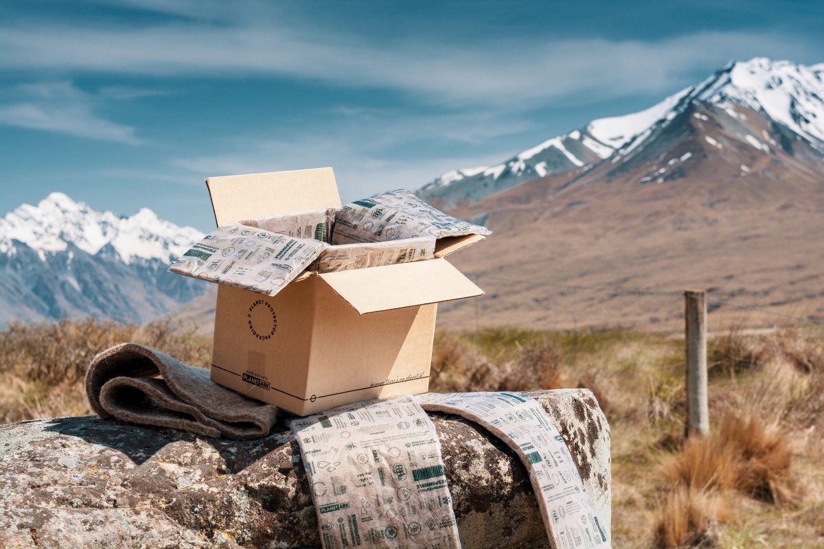 Planet Protector packaging with mountain backdrop