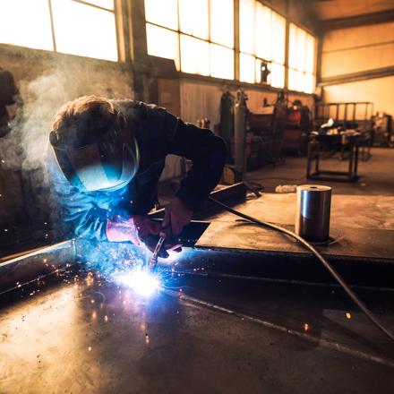 Welder in workshop