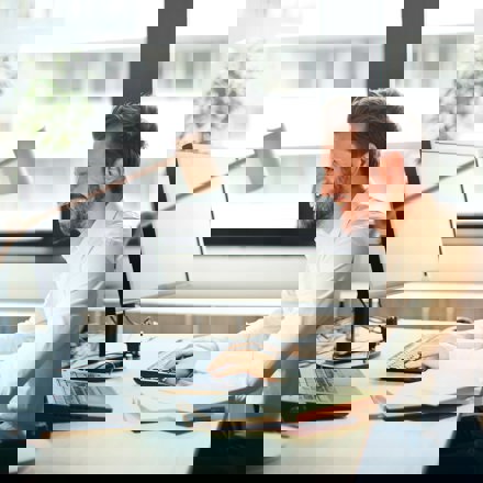 Keiran Reid lookalike working at computer