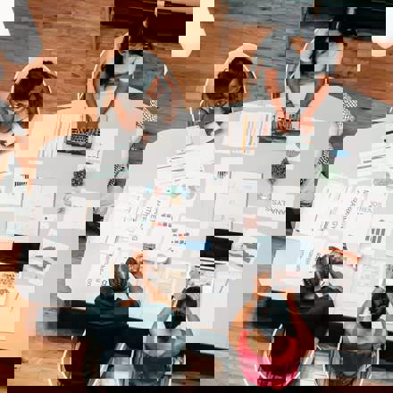 High view of people meeting around table