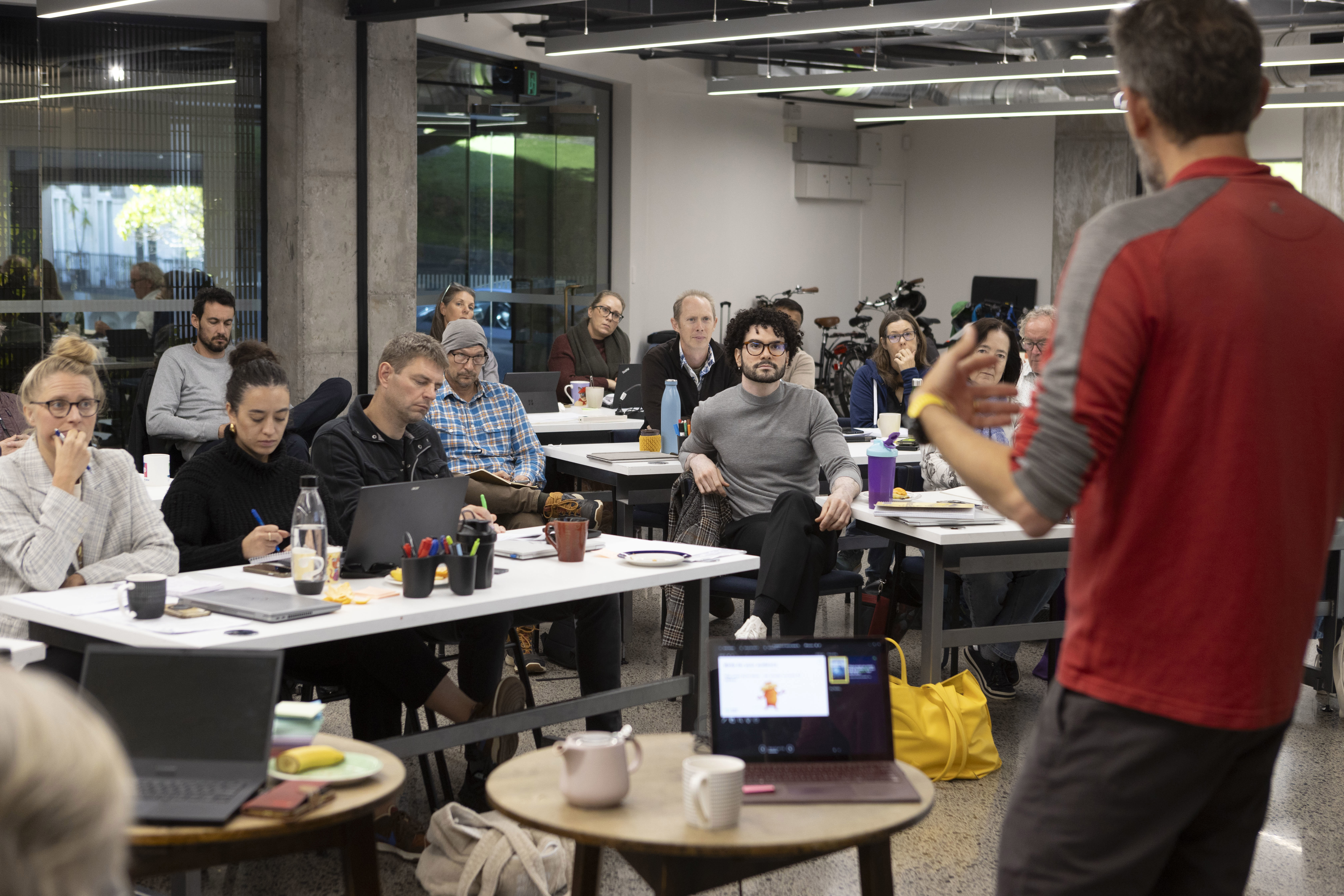 Man presenting at workshop 