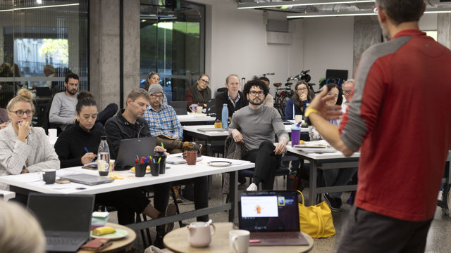 Man presenting at workshop 