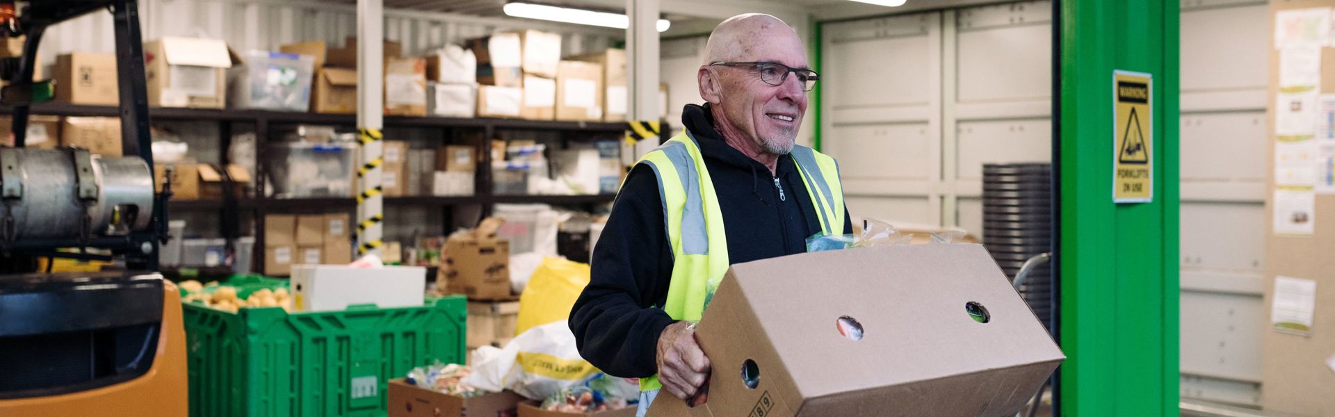 Man carrying box of groceries