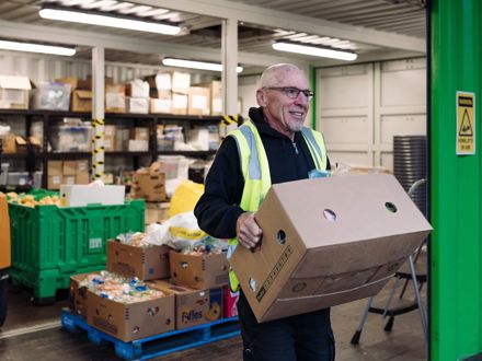 Man carrying box of groceries