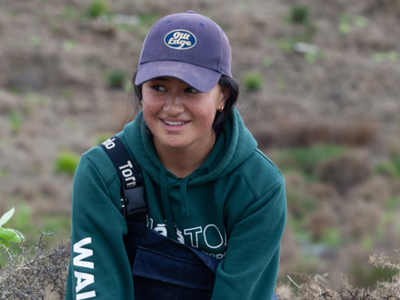young woman planting trees