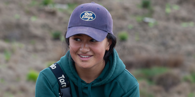 young woman planting trees