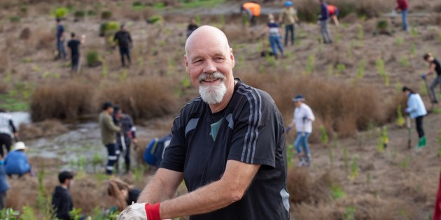 Man with spade at tree planting day