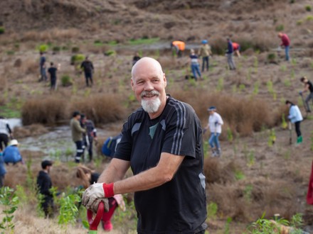 Man with spade at tree planting day
