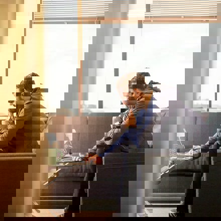 Man looking at computer thinking