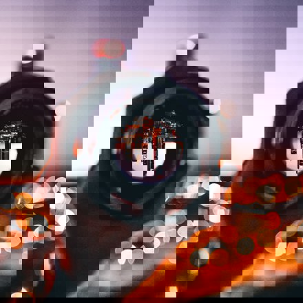 Camera lens looking at upside down city