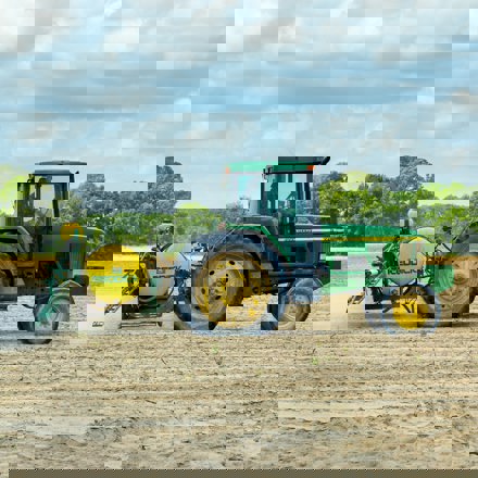 Tractor spraying paddock