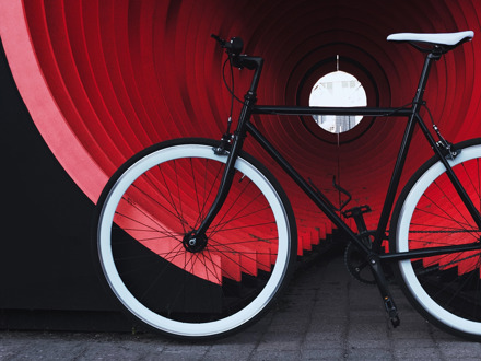 Bike in front of red tunnel