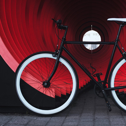 Bike in front of red tunnel