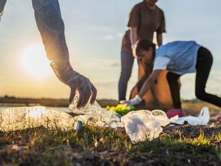 People picking up plastic waste