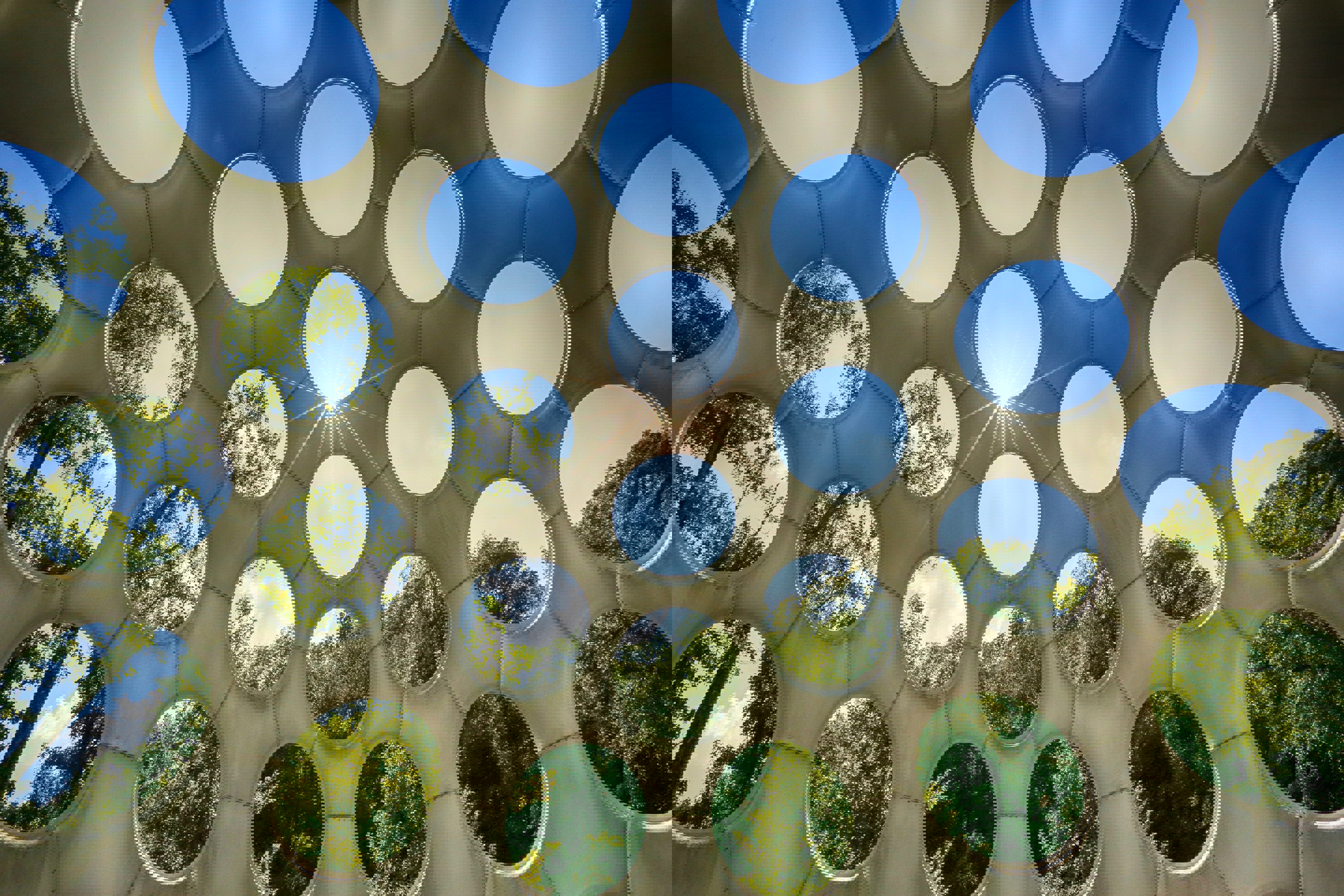 Roof with circular cutouts