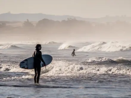 Person with surfboard