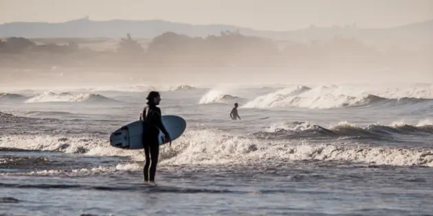 Person with surfboard