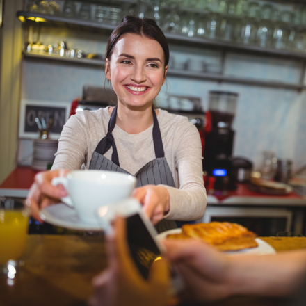 Waitress serving coffee