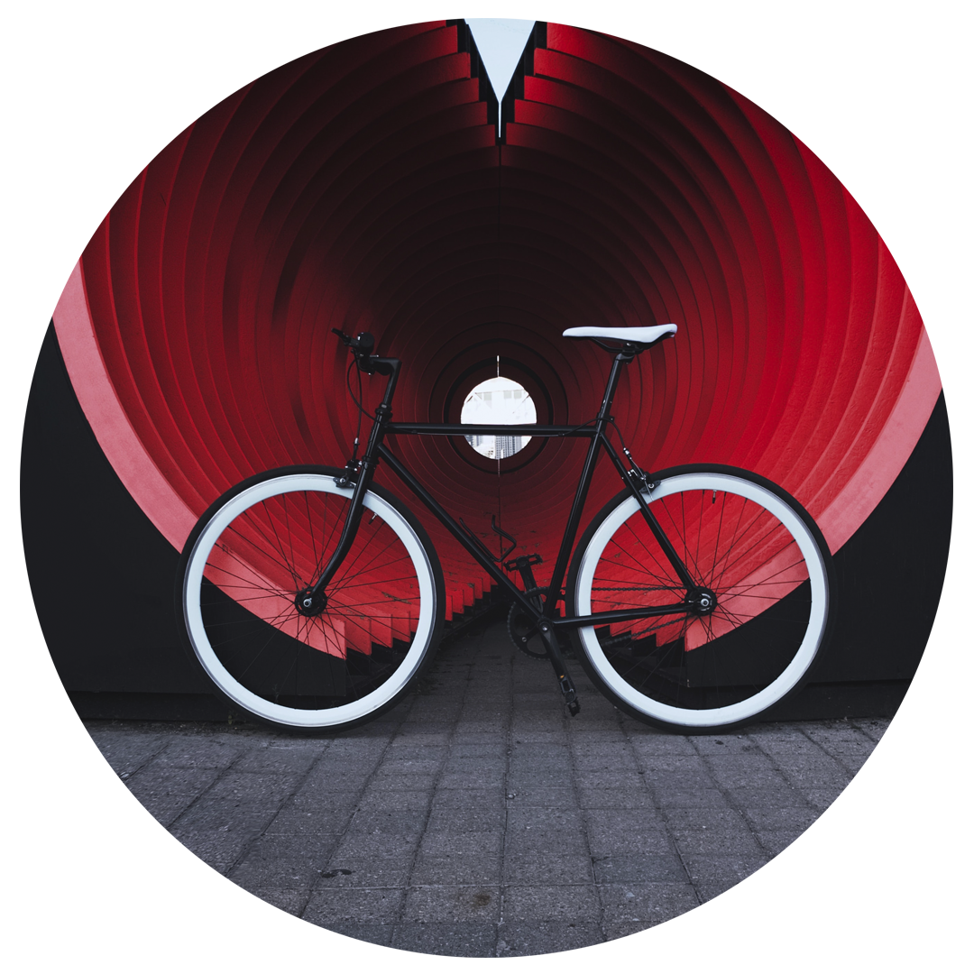Bike against red circular structure