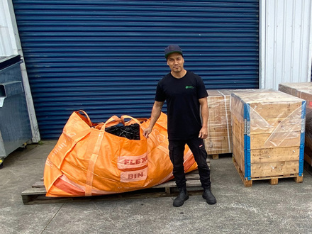 Man with large bag of rubber gaskets